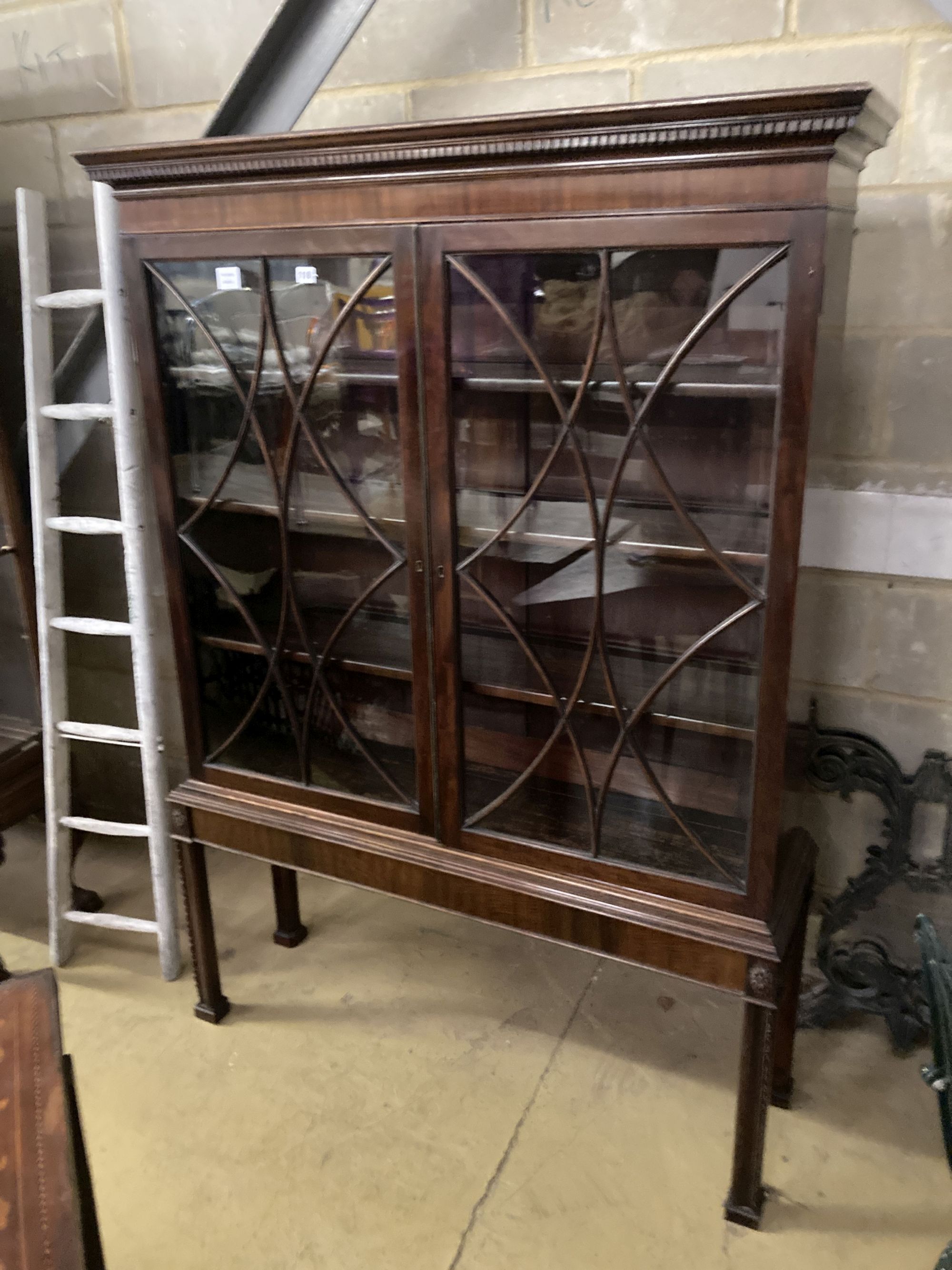 An early 20th century Chippendale revival glazed mahogany bookcase, width 120cm, depth 35cm, height 169cm